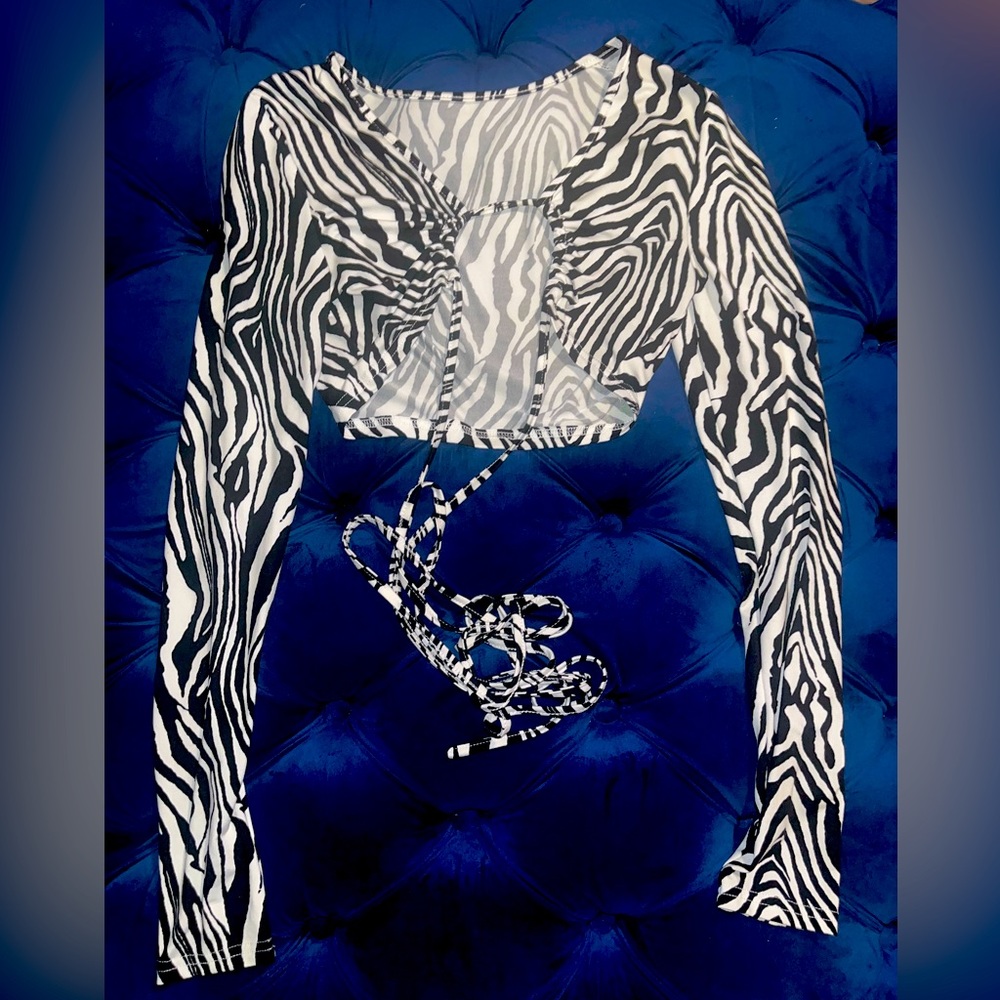 Long sleeve Zebra print tie up crop top. Size medium.